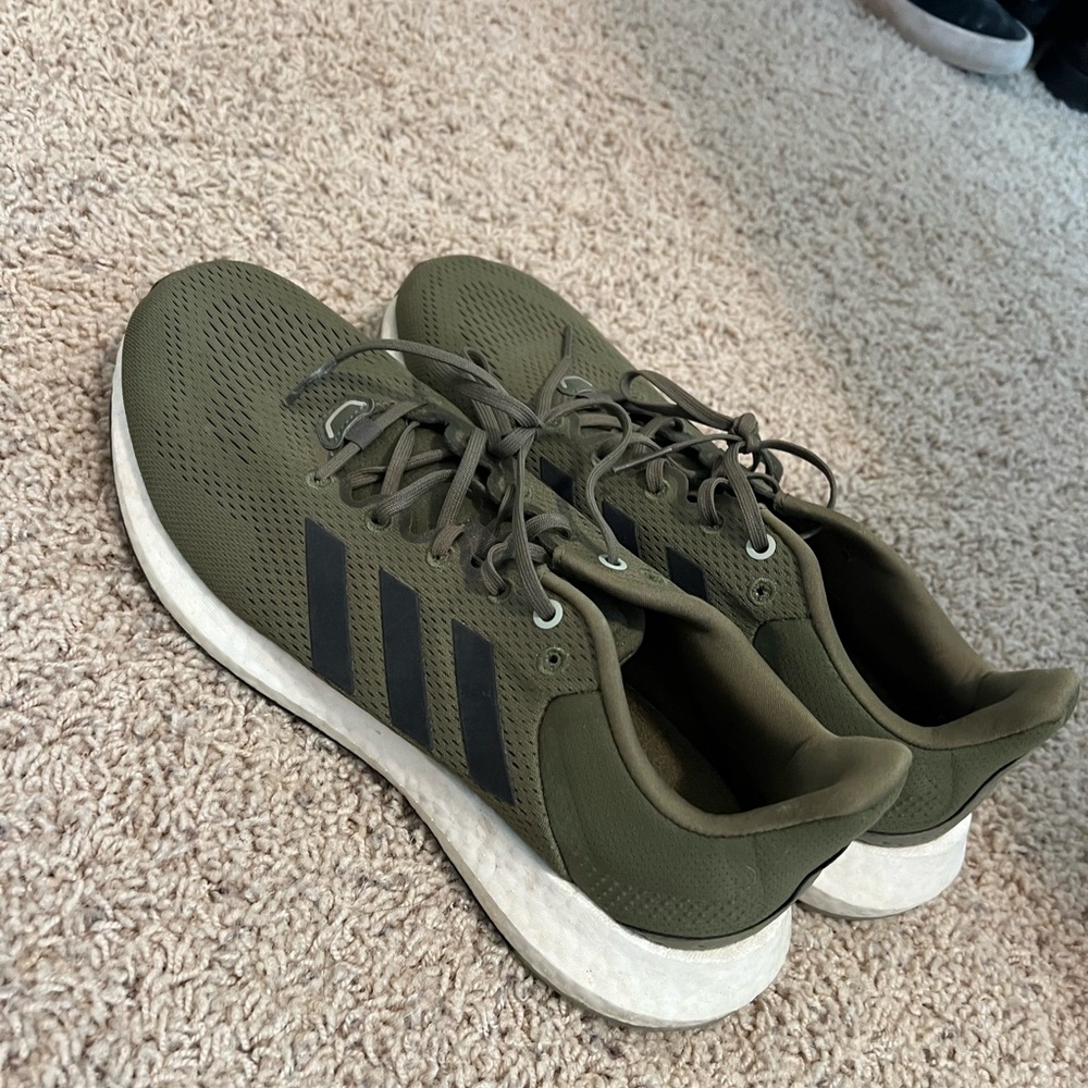 Green men adidas running shoes